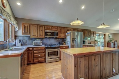 Beautiful Contemporary Home on the Golf Course at High Meadows on High Meadows Golf and Country Club in North Carolina - for sale on GolfHomes.com, golf home, golf lot