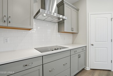 Our most sought after plan, the Roland II, boasts four bedrooms on Ladys Island Country Club in South Carolina - for sale on GolfHomes.com, golf home, golf lot