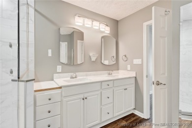Welcome to 1215 Four Wood Drive, a beautifully updated home on a on Baywood Golf Club in North Carolina - for sale on GolfHomes.com, golf home, golf lot