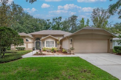 Welcome to this charming three-bedroom, two-bathroom home on River Hills Country Club in Florida - for sale on GolfHomes.com, golf home, golf lot