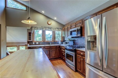 Beautiful Contemporary Home on the Golf Course at High Meadows on High Meadows Golf and Country Club in North Carolina - for sale on GolfHomes.com, golf home, golf lot