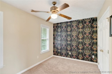 Welcome to 1215 Four Wood Drive, a beautifully updated home on a on Baywood Golf Club in North Carolina - for sale on GolfHomes.com, golf home, golf lot