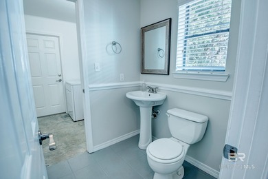 Welcome to 1349 West Fairway Drive, located in the heart of Gulf on The Golf Club of the Wharf in Alabama - for sale on GolfHomes.com, golf home, golf lot