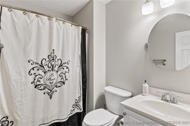Welcome to 1215 Four Wood Drive, a beautifully updated home on a on Baywood Golf Club in North Carolina - for sale on GolfHomes.com, golf home, golf lot