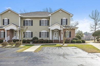 A stunning first floor condo in the Osprey Creek section of Sea on Sea Trail Golf Resort in North Carolina - for sale on GolfHomes.com, golf home, golf lot