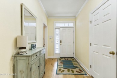A stunning first floor condo in the Osprey Creek section of Sea on Sea Trail Golf Resort in North Carolina - for sale on GolfHomes.com, golf home, golf lot