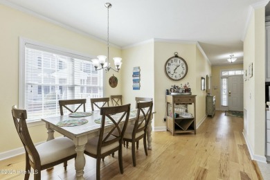 A stunning first floor condo in the Osprey Creek section of Sea on Sea Trail Golf Resort in North Carolina - for sale on GolfHomes.com, golf home, golf lot