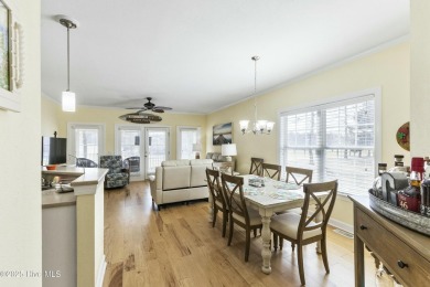 A stunning first floor condo in the Osprey Creek section of Sea on Sea Trail Golf Resort in North Carolina - for sale on GolfHomes.com, golf home, golf lot