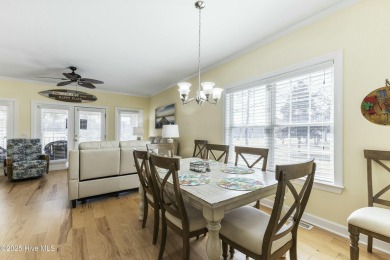 A stunning first floor condo in the Osprey Creek section of Sea on Sea Trail Golf Resort in North Carolina - for sale on GolfHomes.com, golf home, golf lot