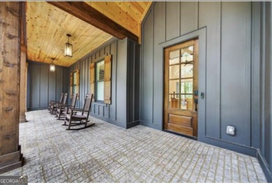Experience elegance and privacy in this immaculate 4-bedroom, 3 on Harbor Club Golf and Country Club in Georgia - for sale on GolfHomes.com, golf home, golf lot