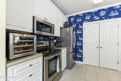 A stunning first floor condo in the Osprey Creek section of Sea on Sea Trail Golf Resort in North Carolina - for sale on GolfHomes.com, golf home, golf lot