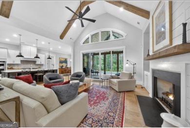 Experience elegance and privacy in this immaculate 4-bedroom, 3 on Harbor Club Golf and Country Club in Georgia - for sale on GolfHomes.com, golf home, golf lot