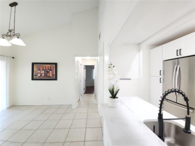 One or more photos is virtually staged!**PRIDE OF OWNERSHIP ( 24 on Cove Cay Country Club in Florida - for sale on GolfHomes.com, golf home, golf lot