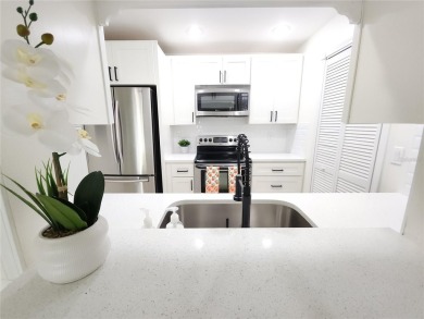 One or more photos is virtually staged!**PRIDE OF OWNERSHIP ( 24 on Cove Cay Country Club in Florida - for sale on GolfHomes.com, golf home, golf lot