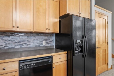 Spring into this wonderful END UNIT townhome.  WINDOWS on 3 on Boulder Pointe Golf Club in Minnesota - for sale on GolfHomes.com, golf home, golf lot
