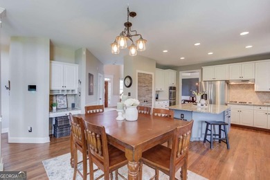 Lakefront living in sought after Hamilton Mill, priced to sell! on Hamilton Mill Golf Club in Georgia - for sale on GolfHomes.com, golf home, golf lot