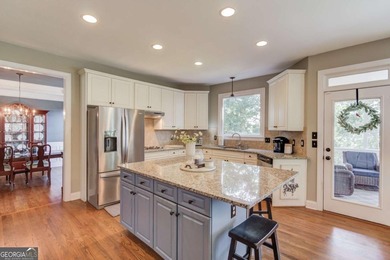 Lakefront living in sought after Hamilton Mill, priced to sell! on Hamilton Mill Golf Club in Georgia - for sale on GolfHomes.com, golf home, golf lot