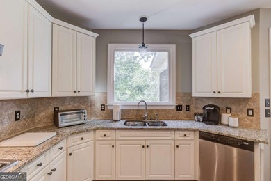 Lakefront living in sought after Hamilton Mill, priced to sell! on Hamilton Mill Golf Club in Georgia - for sale on GolfHomes.com, golf home, golf lot