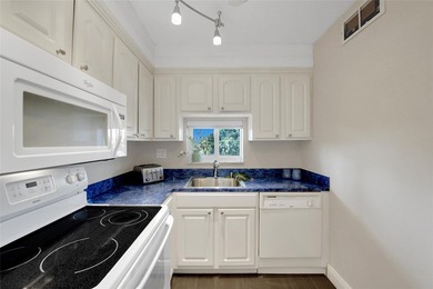 LOCATION, LOCATION, LOCATION! This beautifully remodeled 2-bed on Hollybrook Golf and Tennis Club  in Florida - for sale on GolfHomes.com, golf home, golf lot