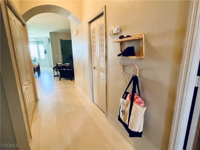 Enjoy breathtaking views from this 3rd-floor Brookside model on Heritage Palms Golf and Country Club in Florida - for sale on GolfHomes.com, golf home, golf lot