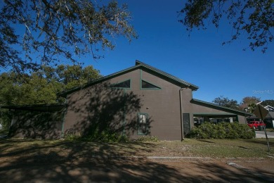 Swiss Chalet style home in Central Lakeland close to on Cleveland Heights Golf Course in Florida - for sale on GolfHomes.com, golf home, golf lot