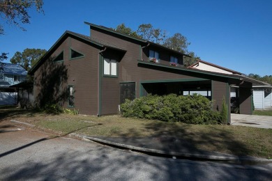 Swiss Chalet style home in Central Lakeland close to on Cleveland Heights Golf Course in Florida - for sale on GolfHomes.com, golf home, golf lot