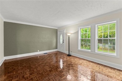 Discover this charming, updated 2-bedroom, 1-bathroom home with on John A. White Golf Course in Georgia - for sale on GolfHomes.com, golf home, golf lot
