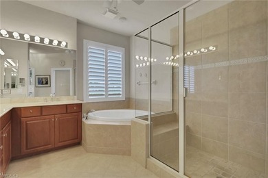 This well-cared for Coach Home features stainless steel on Quail West Golf and Country Club in Florida - for sale on GolfHomes.com, golf home, golf lot