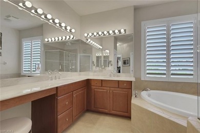 This well-cared for Coach Home features stainless steel on Quail West Golf and Country Club in Florida - for sale on GolfHomes.com, golf home, golf lot