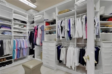 This well-cared for Coach Home features stainless steel on Quail West Golf and Country Club in Florida - for sale on GolfHomes.com, golf home, golf lot