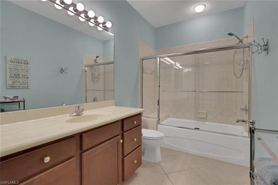 This well-cared for Coach Home features stainless steel on Quail West Golf and Country Club in Florida - for sale on GolfHomes.com, golf home, golf lot