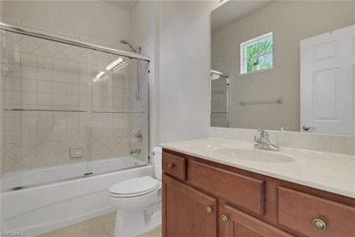 This well-cared for Coach Home features stainless steel on Quail West Golf and Country Club in Florida - for sale on GolfHomes.com, golf home, golf lot