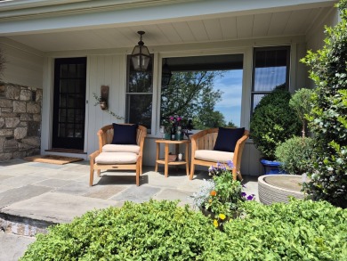 Discover the perfect blend of modern updates and timeless charm on Ridgewood Country Club in Connecticut - for sale on GolfHomes.com, golf home, golf lot