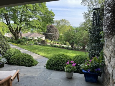 Discover the perfect blend of modern updates and timeless charm on Ridgewood Country Club in Connecticut - for sale on GolfHomes.com, golf home, golf lot