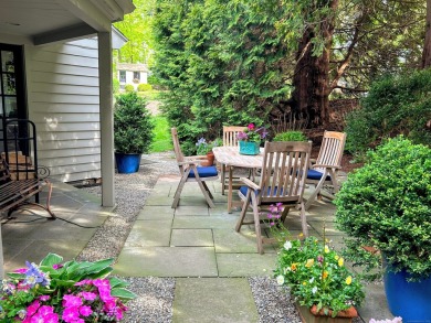 Discover the perfect blend of modern updates and timeless charm on Ridgewood Country Club in Connecticut - for sale on GolfHomes.com, golf home, golf lot