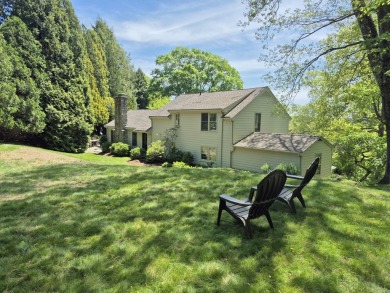 Discover the perfect blend of modern updates and timeless charm on Ridgewood Country Club in Connecticut - for sale on GolfHomes.com, golf home, golf lot