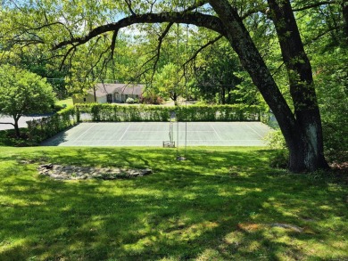 Discover the perfect blend of modern updates and timeless charm on Ridgewood Country Club in Connecticut - for sale on GolfHomes.com, golf home, golf lot