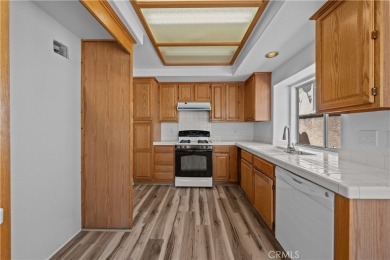 Welcome to this beautifully updated single-story courtyard home on  in California - for sale on GolfHomes.com, golf home, golf lot