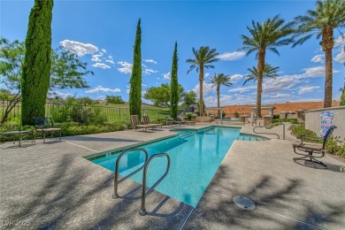 Experience resort-style living in this stunning single-story on Reflection Bay Golf Club in Nevada - for sale on GolfHomes.com, golf home, golf lot