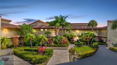 This spacious 3/2 condo in Cypress at Woodmont, offering 1,792 on Woodmont Country Club in Florida - for sale on GolfHomes.com, golf home, golf lot