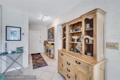 This spacious 3/2 condo in Cypress at Woodmont, offering 1,792 on Woodmont Country Club in Florida - for sale on GolfHomes.com, golf home, golf lot
