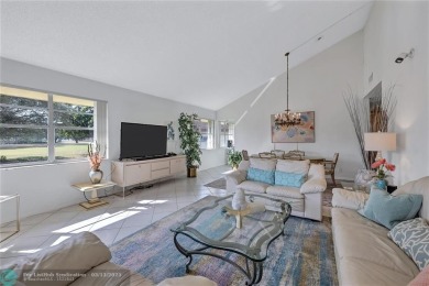 This spacious 3/2 condo in Cypress at Woodmont, offering 1,792 on Woodmont Country Club in Florida - for sale on GolfHomes.com, golf home, golf lot