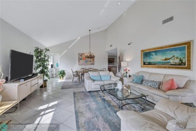 This spacious 3/2 condo in Cypress at Woodmont, offering 1,792 on Woodmont Country Club in Florida - for sale on GolfHomes.com, golf home, golf lot