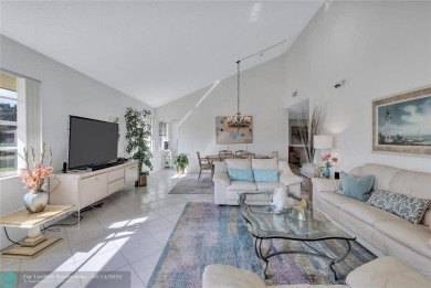 This spacious 3/2 condo in Cypress at Woodmont, offering 1,792 on Woodmont Country Club in Florida - for sale on GolfHomes.com, golf home, golf lot
