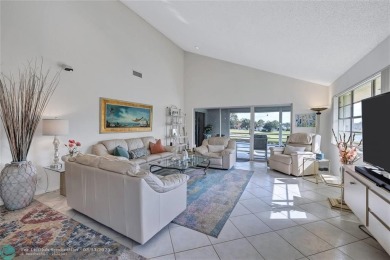 This spacious 3/2 condo in Cypress at Woodmont, offering 1,792 on Woodmont Country Club in Florida - for sale on GolfHomes.com, golf home, golf lot