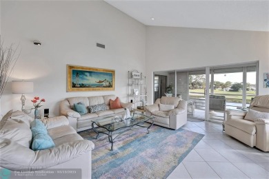 This spacious 3/2 condo in Cypress at Woodmont, offering 1,792 on Woodmont Country Club in Florida - for sale on GolfHomes.com, golf home, golf lot