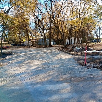 Come check out this exceptional 0.53-acre double corner lot! The on Linn Valley Lakes - Deer Trace Golf Course in Kansas - for sale on GolfHomes.com, golf home, golf lot