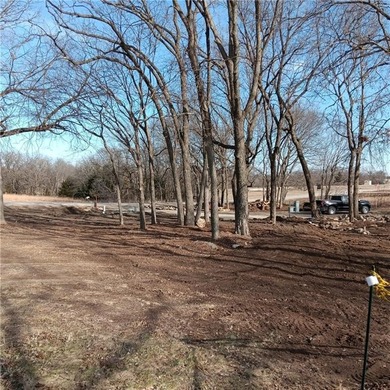 Come check out this exceptional 0.53-acre double corner lot! The on Linn Valley Lakes - Deer Trace Golf Course in Kansas - for sale on GolfHomes.com, golf home, golf lot