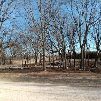 Come check out this exceptional 0.53-acre double corner lot! The on Linn Valley Lakes - Deer Trace Golf Course in Kansas - for sale on GolfHomes.com, golf home, golf lot