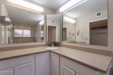 This updated and beautiful 3-bedroom home is move in ready with on Sun City Lakes West and East in Arizona - for sale on GolfHomes.com, golf home, golf lot